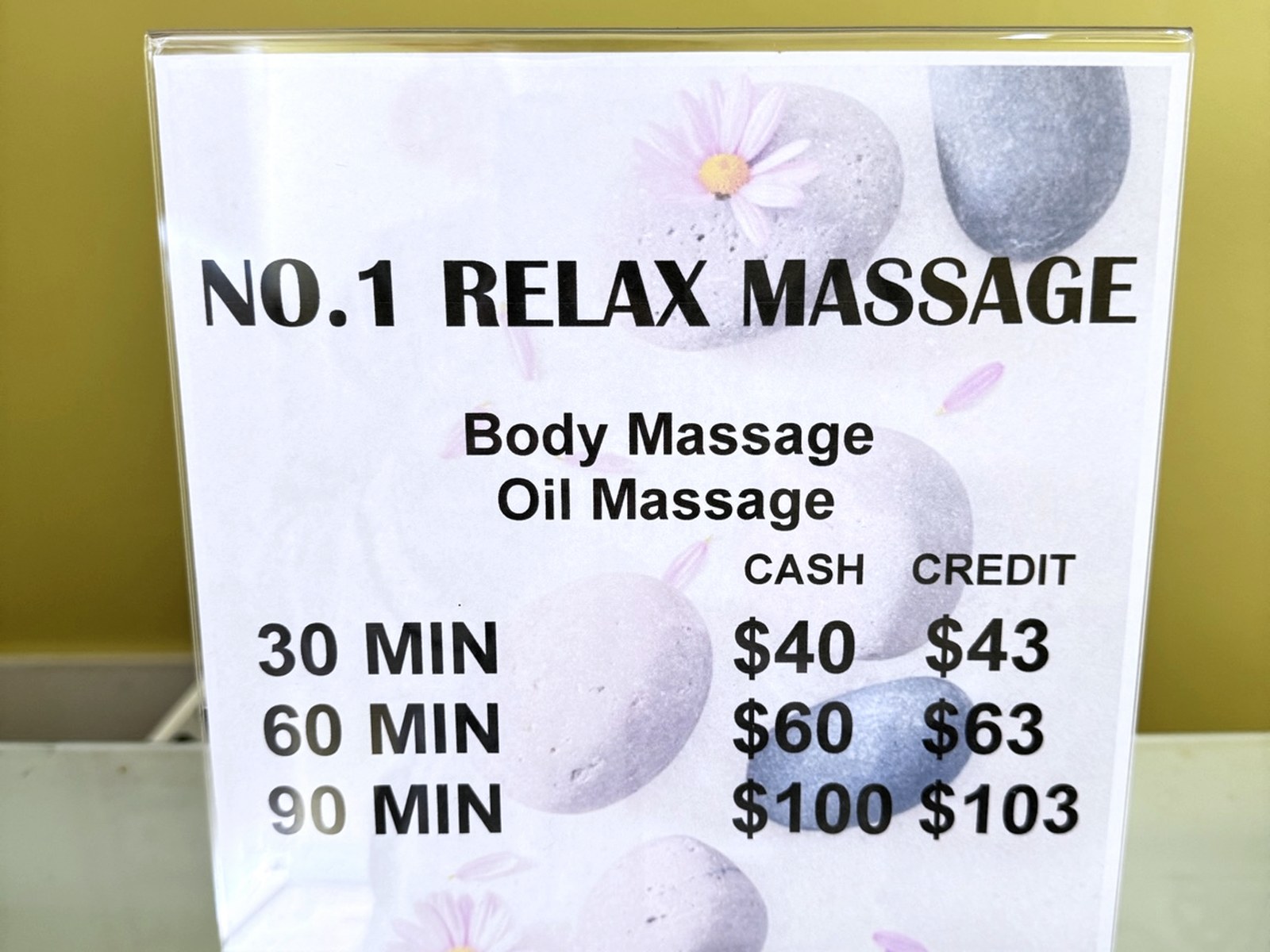 Spa detail and massage pricing board